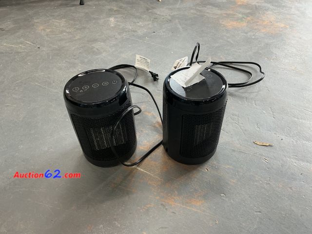 Lot 44-617j - Two Round Heaters
 See All Photo's E-Commerce Return, A basic inspection has been given to this item. Sold AS-IS. Used Powers on, not tested...