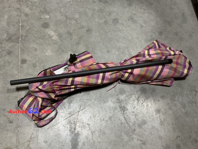 Lot 44-4010b - 7.5’ Round Plaid Patio Umbrella  Appears New, A basic inspection has been given to this item. Sold AS-IS.
