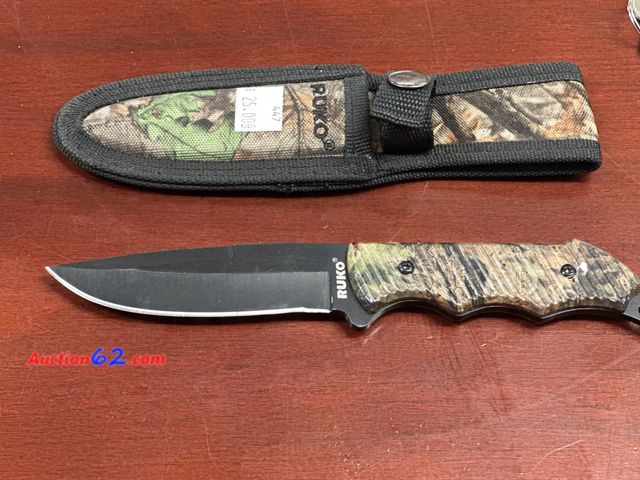 Lot 44-6219w - RUKO hunting knife in camo sheath with belt hook. Pre tagged $25 from store closing. New. See All Photo's Not Tested Unmarked, No barcodes