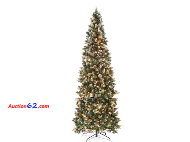 Lot 44-6973w - 9ft Pre-Lit Partially Flocked Pencil Christmas Tree w/ Pine Cones, Metal Stand Appears New, A basic inspection has been given to this item. ...