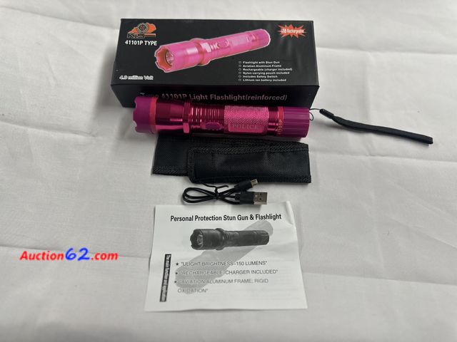 Lot 44-6014f - KS 41101 P pink stun gun and flashlight. 4.9 million volt aviation aluminum frame rechargeable. New. See All Photo's Not Tested Never opened...