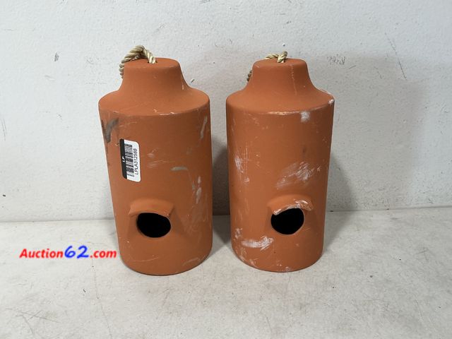 Lot 44-768 - Lot of 2 Terracotta Birdhouses with Rope Hangers See All Photo's Not Tested E-Commerce Return, A basic inspection has been given to this ite...