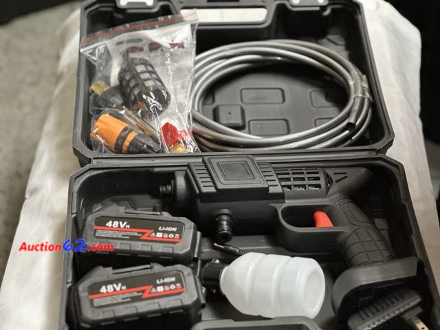 Lot 44-6049o - Battery operated pressure washer - cleaning gun. Comes with 2 batteries and charger. New. Opened for photos. See All Photo's Not Tested Neve...