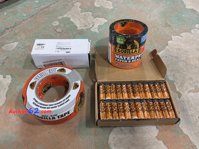 Lot 44-967 - Gorilla Tape Bundle: White Tape, Waterproof Patch &amp; Seal, HQRP Flashlight, AA Batteries Not Tested E-Commerce Return, A basic inspection...