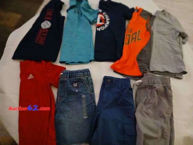 Lot 44-2012a - One group of new and gently used size 6 and 5/6 boys clothes . One new Oshkosh size 6 shorts.  One pair of size 6 Tommy Bahama shorts.  One ...