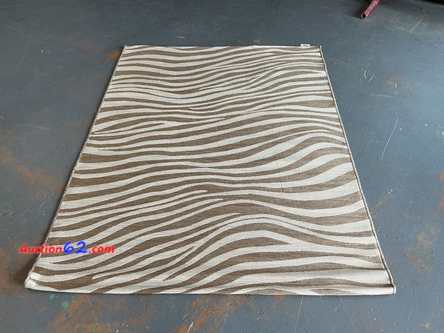 Lot 44-851 - Modern Zebra Wave Area Rug See All Photo's Not Tested E-Commerce Return, A basic inspection has been given to this item. Sold AS-IS.