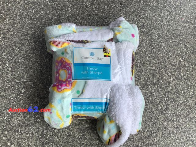 Lot 44-4010m - Lot of (1) 50x60” throw with Sherpa. Donut themed. Appears New, A basic inspection has been given to this item. Sold AS-IS. See All Photo's