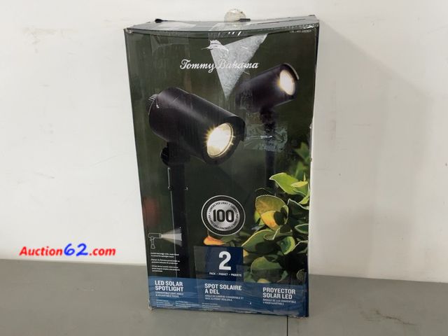 Lot 44-1508j - Tommy Bahama Smart Focus 100/60 Lumen Spot Light with Remote Solar Panel 2 Pack Not Tested See All Photo's E-Commerce Return, A basic inspec...