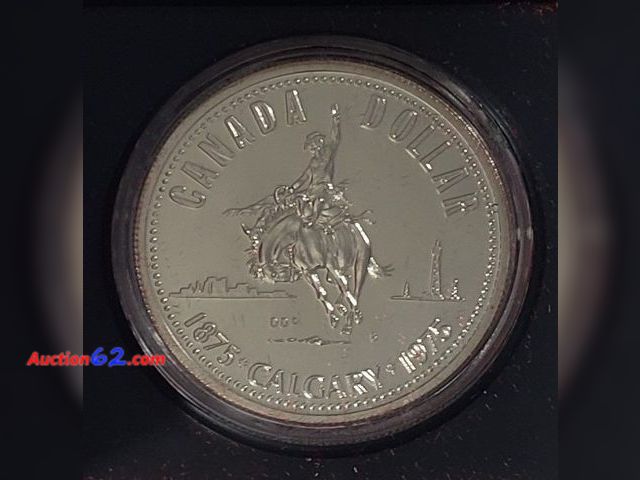 Lot 44-8300q - 1975 CANADIAN .375 TROY OUNCES SILVER DOLLAR CELEBRATING THE CALGARY CENTENNIAL WITH THE QUEEN ON THE REVERSE. COMES WITH ORIGINAL ROYAL CAN...