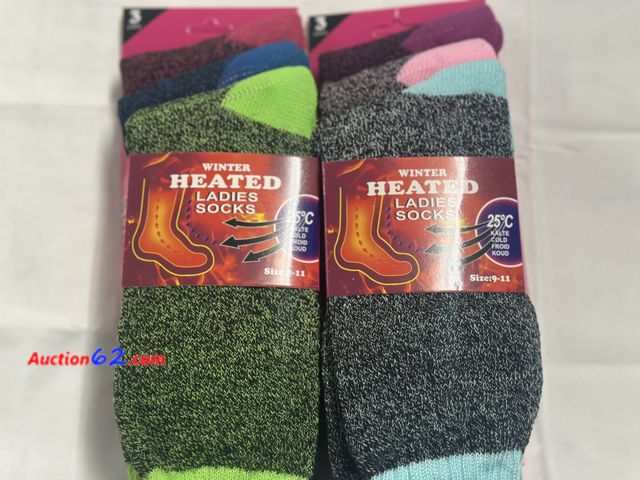 Lot 44-6106f - 6 pair ladies winter heated socks 25c all different colors.NEW. See All Photo's Not Tested Never opened, Factory Sealed