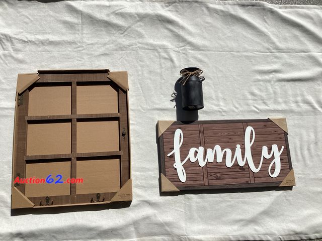 Lot 44-7866P - Lot of (1) wooden windowpane plaque, (1) family canvas , (1) black milk carton vase.  Appears New, A basic inspection has been given to this...