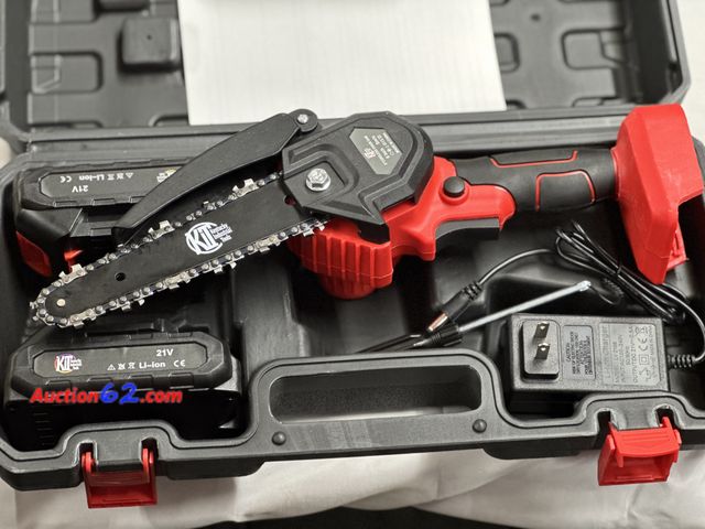 Lot 44-6010j - KIT BRAND 6 in rechargeable 21 V chainsaw, comes with 2 batteries and charger. NEW. Opened for photos. See All Photo's Not Tested