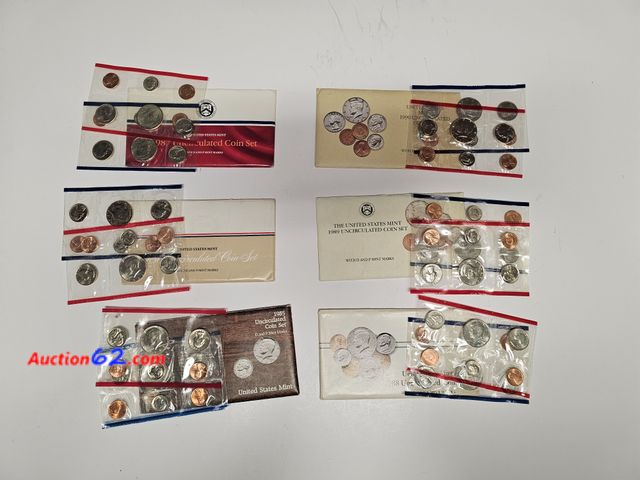 Lot 44-8512j - 6 MINT SET LOT - 1985, 1986, 1987, 1988, 1989 AND 1990. EACH SET HAS PHILADELPHIA AND DENVER MINT KENNEDY HALF DOLLARS, WASHINGTON QUARTERS,...
