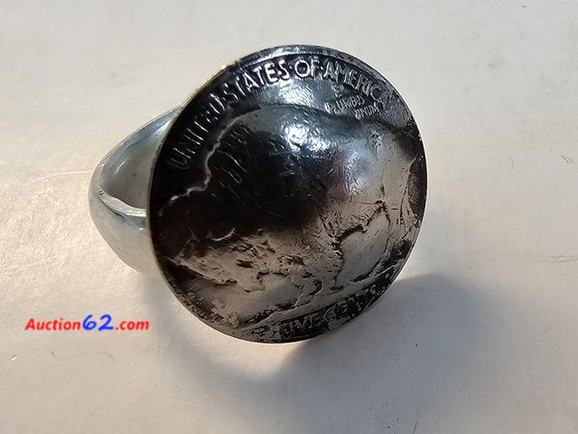 Lot 44-8384w - THICK .925 STERLING RING WITH A BUFFALO NICKEL. APPROXIMATELY A SIZE 8. PLEASE LOOK AT THE PHOTO OF THE RING ON THE SIZER FOR YOUR OPINION.-...