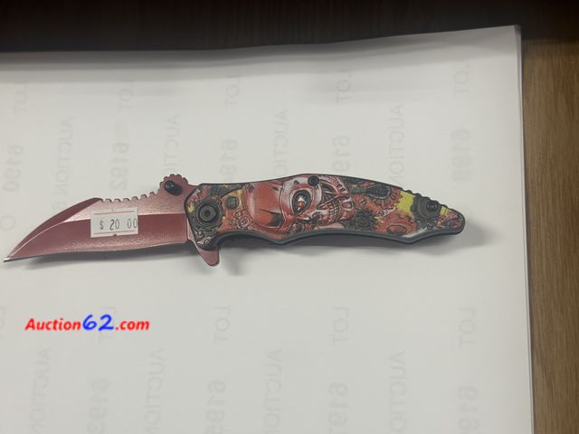 Lot 44-6021o - China knife with skull approx 4.5 in long, belt clip. New pre tagged $20 store closing. No box. See All Photo's Tested & Working Unmarked, N...