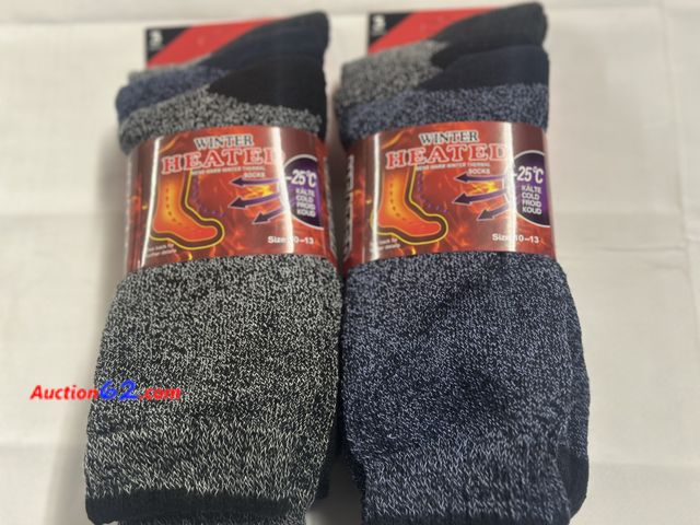 Lot 44-6108f - 6 pair mens winter heated socks 25c 3 different colors.NEW. See All Photo's Not Tested Never opened, Factory Sealed
