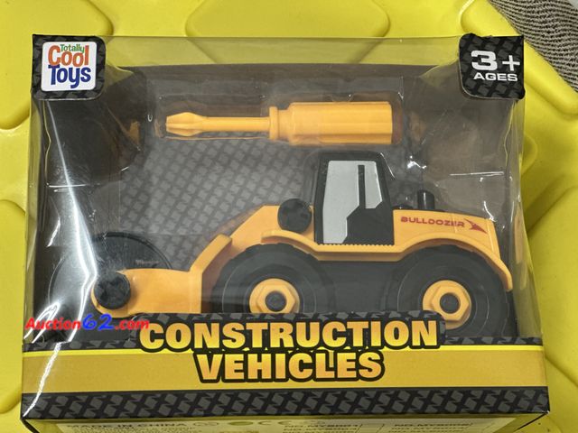 Lot 44-7514b - Cool toys construction vehicle roller tractor comes with screwdriver to take apart. New. Ages 3 5. Not Tested 13. Never opened, Factory Seal...