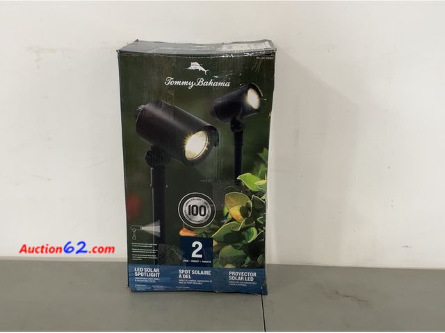 Lot 44-1505j - Tommy Bahama Smart Focus 100/60 Lumen Spot Light with Remote Solar Panel 2 Pack Not Tested See All Photo's E-Commerce Return, A basic inspec...
