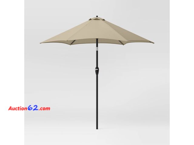 Lot 44-139 - Target Plus 8 ft Round Outdoor Patio Umbrella - Tan See All Photo's Appears New, A basic inspection has been given to this item. Sold AS-IS.