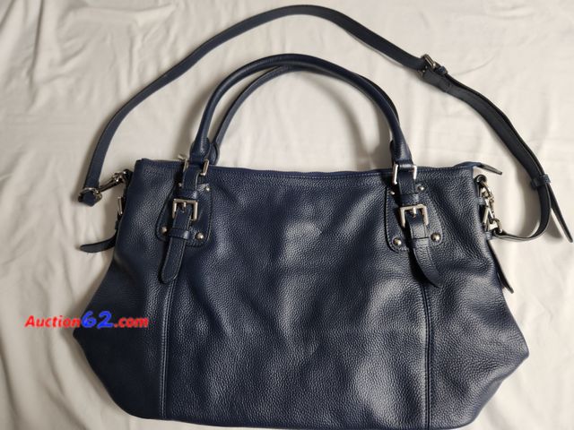 Lot 44-2330b - 1 new fzone leather navy blue purse with satin lining. Approx 16 in W x 11 1/2 H. See photos. 1. Appears New, A basic inspection has been gi...
