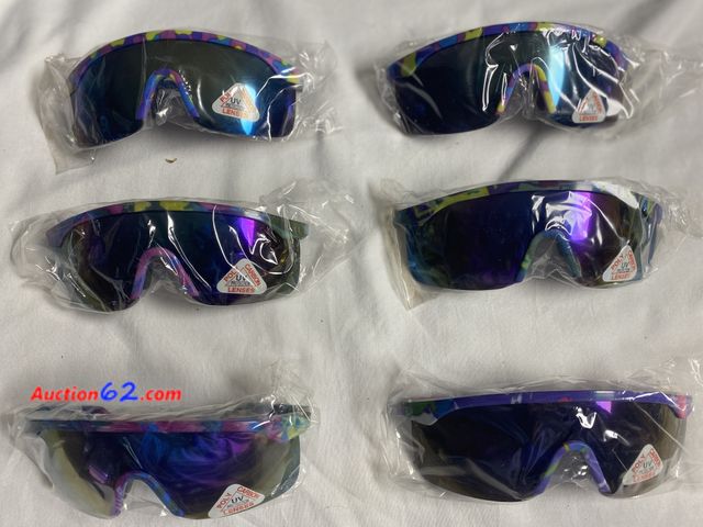 Lot 44-2001w - New. 6 pairs of multi color frame youth sunglasses. Poly Carbonate lenses. UV Protection. See photos. Appears New, A basic inspection has be...