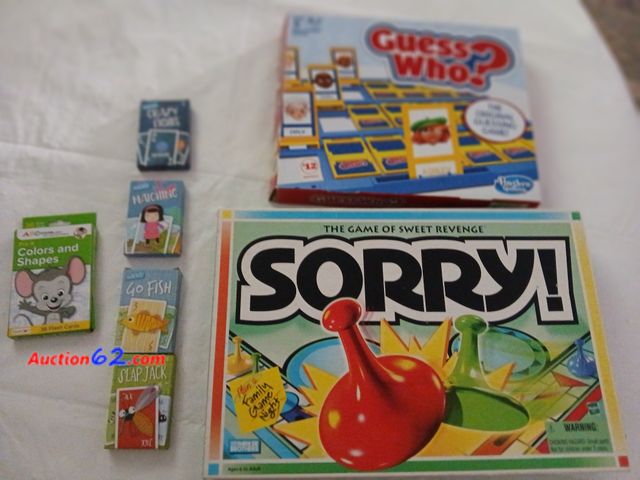 Lot 44-4037w - Used Sorry game with all pieces.  Used Guess Who game complete.  New Crazy Eight card game.  New Matching card games.  New Go Fish card game...