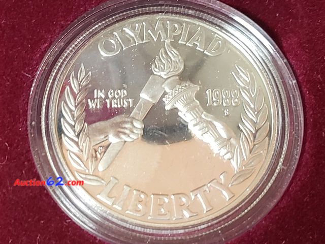 Lot 44-8325k - 1988 OLYMPIC 90% SILVER DOLLAR PROOF COMMEMORATIVE. MINTED IN SAN FRANCISCO. IN ORIGINAL US MINT PACKAGING.-NT