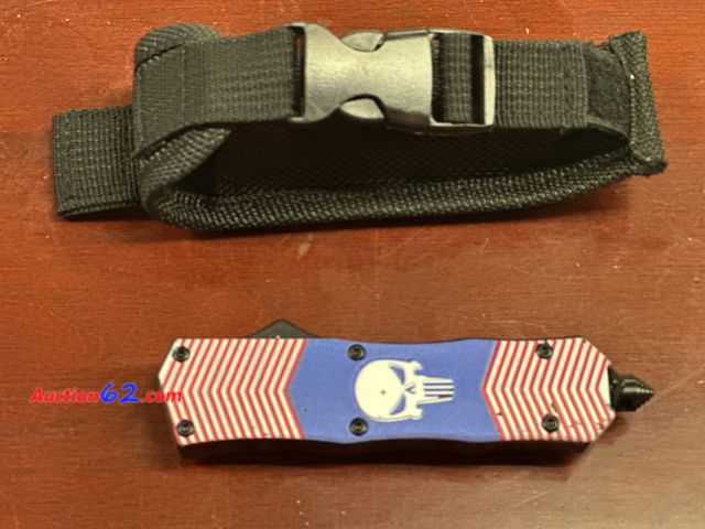 Lot 44-6202w - Punisher out the front knife with glass breaker, belt clip, nylon carrying case. New. Nice and heavy. See All Photo's Tested & Working Never...