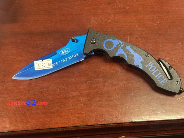 Lot 44-6218w - Kentucky cutlery police knife, built in glass breaker and seatbelt cutter and belt clip. # 70857. Pre tagged $20 from store closing. New no ...