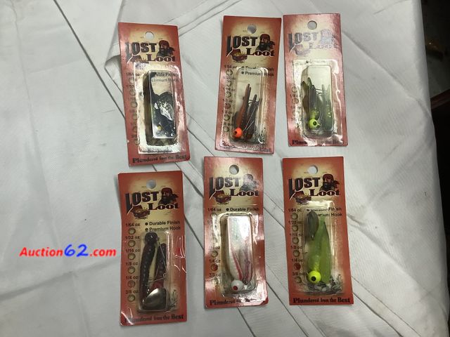 Lot 44-6192e - Six Lost Loot Fish Bate, 1/4oz each, Assorted Colors, Plundered From The Best. Durable Finish, Premium Hooks Appears New, A basic inspection...