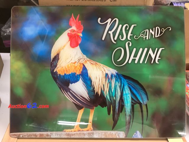 Lot 44-6149e - Rooster “Rise And Shine” Tempered Glass Cutting Board. Appears New, A basic inspection has been given to this item. Sold AS-IS. See All Phot...