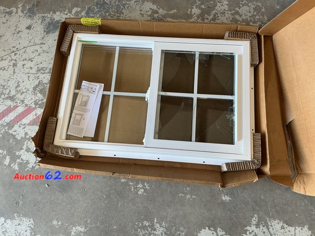 Lot 44-1171g - 24 in. x 36 in. White Double-Pane Insulated Glass Vinyl Single Hung Window with Grids and Screen- Broken Glass E-Commerce Return, A basic in...
