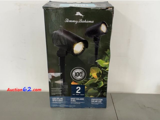 Lot 44-1515j - Tommy Bahama Smart Focus 100/60 Lumen Spot Light with Remote Solar Panel 2 Pack Not Tested See All Photo's E-Commerce Return, A basic inspec...