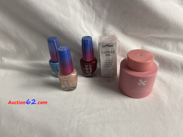 Lot 44-2155g - New. 3- bottles OPI nail polish. They are rapid dry. Colors are snap you fingers, Skip a beet, and stun n’ done. 1 bottle cuticle oil, 1 nai...