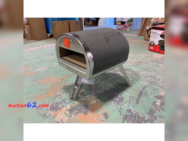Lot 44-817f - Missing all propane hookups. Roccbox Propane Outdoor Pizza Oven E-Commerce Return, A basic inspection has been given to this item. Sold AS-I...