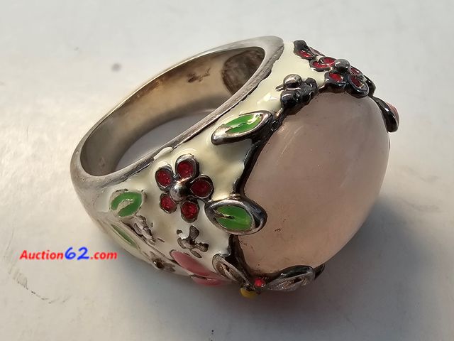 Lot 44-8382w - BIG .925 STERLING SILVER WITH HUGE PRETTY PINK STONE. THE RING IS PAINTED AND ALSO HAS PRETTY FLOWERS AND LEAVES. APPROXIMATELY A SIZE 9. PL...