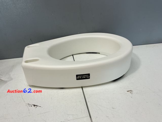 Lot 44-2571f - Compass Health Elevated Toilet Seat Riser Appears New, A basic inspection has been given to this item. Sold AS-IS. Not Tested See All Photo'...