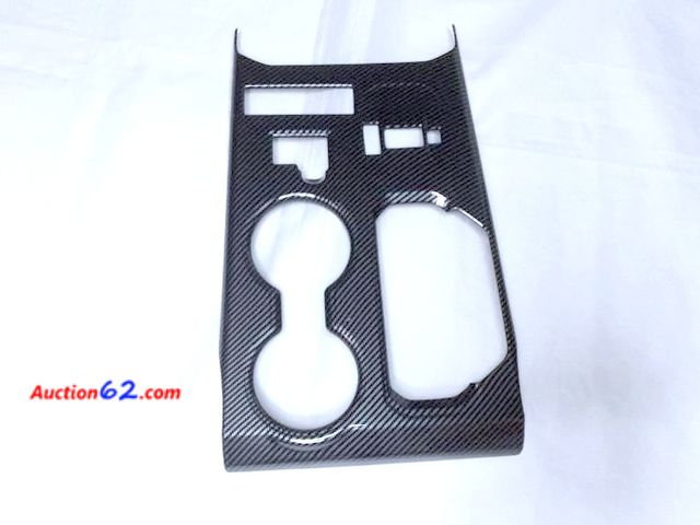 Lot 44-5522p - Carbon Fiber Pattern Black Center Console Shifter Trim Panel Cover Toyota Highlander models from 2020 and newer.