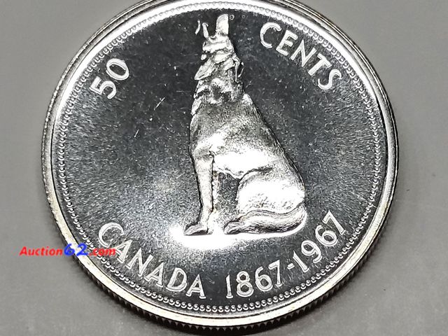 Lot 44-8326q - 1967 CANADIAN SILVER CENTENNIAL PROOF HALF DOLLAR WITH HOWLING WOLF. HAS .3 TROY OUNCES OF SILVER. BRILLIANT UNCIRCULATED.-T