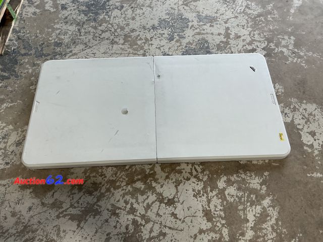 Lot 44-1590w - peakform 4" Fold-In-Half Table, Portable, White has hole on table see photos E-Commerce Return, A basic inspection has been given to this it...