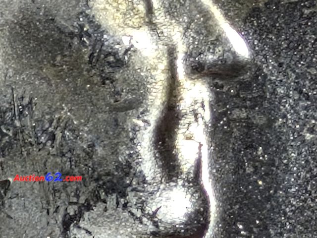 Lot 44-8306i - 1955 "BUGS BUNNY" FRANKLIN 90% SILVER HALF DOLLAR! THIS IS A RARE DIE VARIETY WHERE FRANKLIN LOOKS LIKE HE HAS BUCK TEETH! COIN SHOULD GRADE...