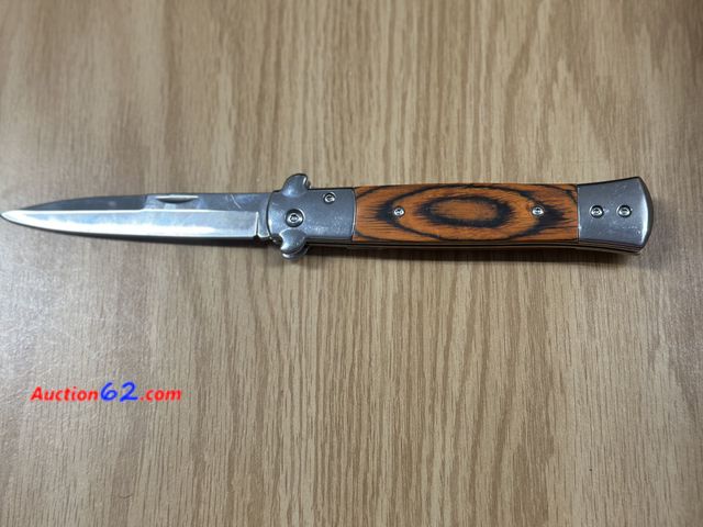 Lot 44-6090q - Knife approximately 5 inches long and weighs 4.9 oz. With belt clip. Pre tagged $20 from store closing. New. No box See All Photo's Tested &...