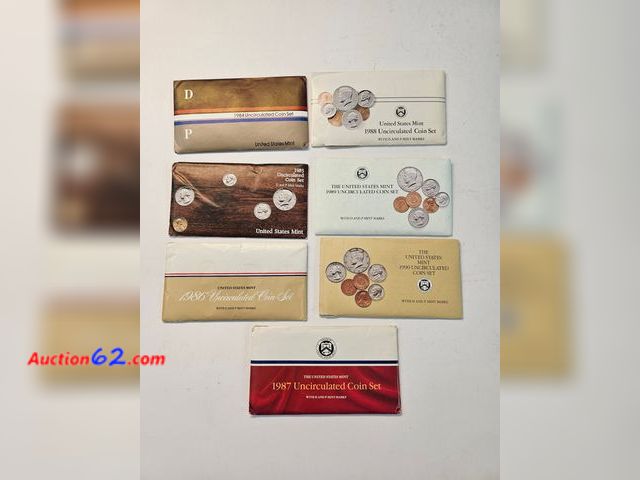 Lot 44-8517i - 7 MINT SET LOT - 1984, 1985, 1986, 1987, 1988, 1989 AND 1990.  EACH SET HAS PHILADELPHIA AND DENVER MINT KENNEDY HALF DOLLARS, WASHINGTON QU...