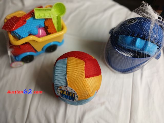 Lot 44-2348b - New shark beach play set, includes 1 rake, 1 shovel, 4 sand molds, one new sand truck with 1 rack, 1 shovel,  4 sand molds, and one beach vo...