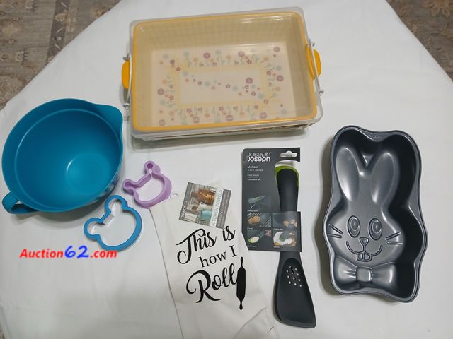 Lot 44-2117j - One new bunny cake pan.  One new Joseph Unitool slotted spoon, retail Amazon 11.00. Is a turner, solid spoon, cutting edge, spatula.  One ne...