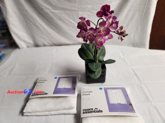 Lot 44-2111g - 2-63 in Sheer White crinkle curtain panels  40 in W x 63 in L. 1 purple artificial orchid plant in black ceramic square planter. New. See ph...
