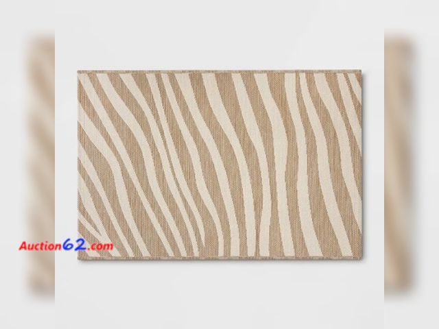 Lot 44-107w - 5’ X 7’ Wavy Lines Outdoor Area Rug Beige/Natural Brown  Appears New, A basic inspection has been given to this item. Sold AS-IS.