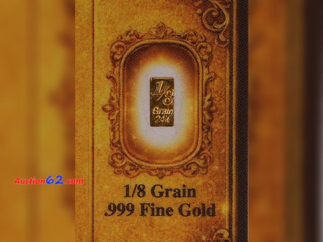 Lot 44-8377m - 1/8TH OF A GRAIN OF .999 FINE PURE GOLD BAR. "THE GOLDEN WEALTH TICKET." MADE BY BENCHMARK STRATEGIC METALS.-NT