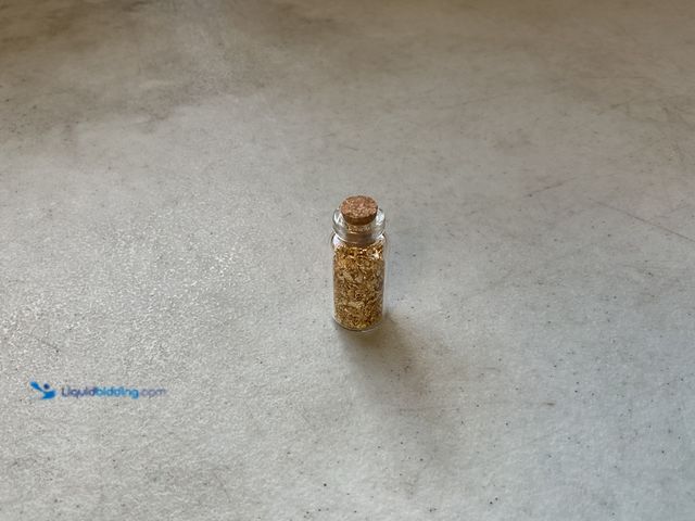 Lot 49-3609221 - RARE ONE INCH GLASS VILE OF PURE 24K GOLD FLAKES