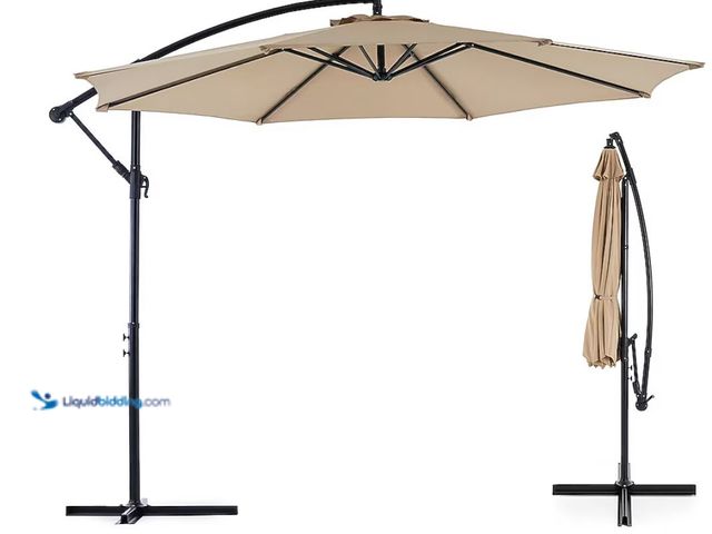 Lot 49-1630903 - 10-Ft Iron Tan Slide-Tilt Cantilever Patio Umbrella, Model # A013-503-010-003, Unused, Has attachmen...